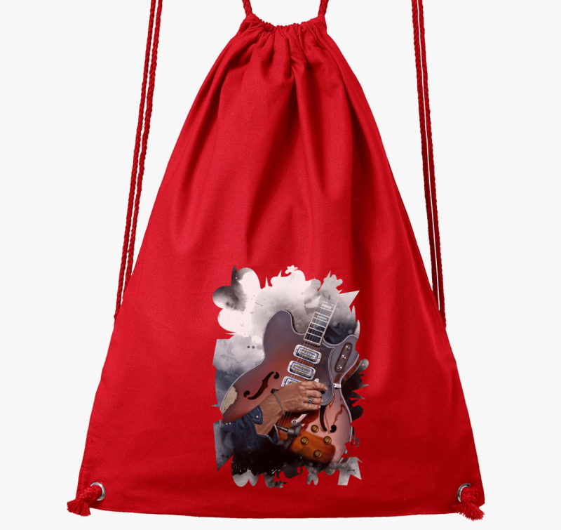 Dan Auerbach gitár tornazsák